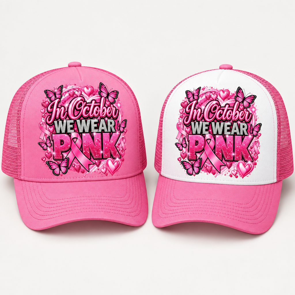 Pink and pink/white trucker hats with In October We Wear Pink artwork